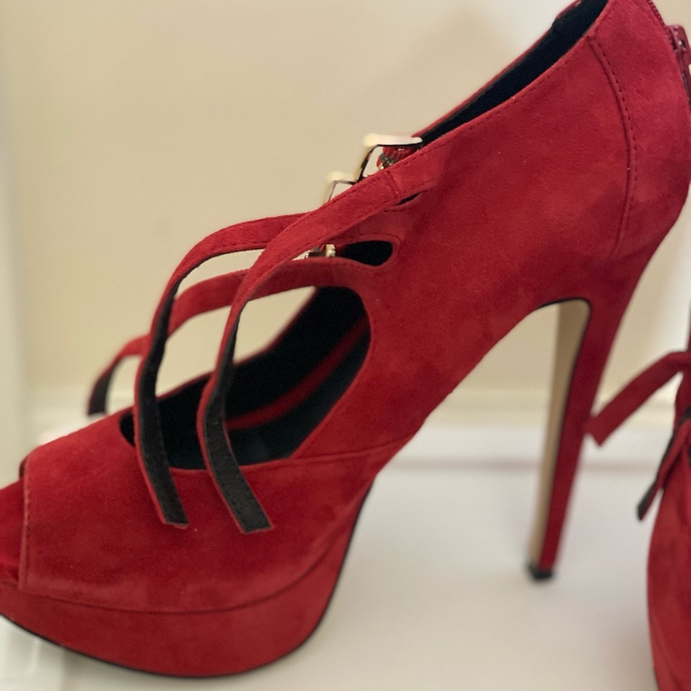 ALDO red peep toe high heel shoe.